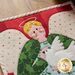 Close up details of the adorable laser cut applique Angel on the Better Not Pout Pot Holder