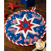 The center star design of the America the Beautiful Folded Star Hot Pad