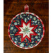 Navy blue floral circular hot pad on a wood table