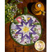 The beautiful round version of the Folded Star Hot Pad - Scented Garden