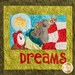 A whimsical fabric illustration featuring a mouse peacefully sleeping with a thought bubble showing cheese, alongside a red alarm clock. The word DREAMS is prominently displayed in bold, colorful letters at the bottom.