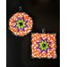 Round and Square hot pads with central folded star design featuring Halloween themed fabrics.