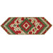 Christmas themed floral table topper on white background.