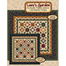 The front of the Lucy's Garden pattern by Kansas Troubles Quilters showing the finished quilt.