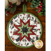 Round hot pad made with white fabric featuring farm animals wearing winter holiday clothes.