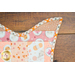 Fish shaped cat pet placemat made of strips of pink and cream cat themed fabrics.