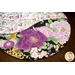 Braided twist made of black and white fabrics featuring purple florals and butterflies.
