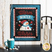 Wall hanging made of wool with blue border and snowman with the phrase 