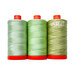 Three spools of various green Aurifil thread from the Walking Palm color builder set