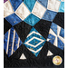 Geometric patterns in blue and white, on black fabric.