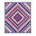 Red, white, and blue quilt of squares in diamond pattern with patriotic themed fabrics.