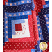 Americana themed quilt blocks with red, white, and blue star-filled fabrics.