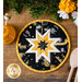 Round Hot pad with central folded star design made of black bee themed fabrics with black and yellow accents.