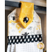 Hanging towel made of white bee themed fabrics with black and yellow accents.