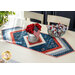 Table runner with central diamond design and angled strips at the ends made of patriotic printed fabrics.