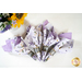 Two sided cloth napkins one side with purple fabric the other with white fabric featuring lavender prints.
