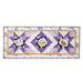 Table runner with geometric design with white and purple lavender and bee themed fabrics.