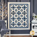 Quilt with geometric designs of squares and diamonds in blue and cream fabrics.