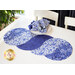 Table runner with overlapping "S" curve design made of blue and white floral printed fabrics.