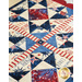 Pint Size Table Runner featuring geometric stars in red, white, and blue, along with star and firework appliqué at each end.