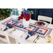 Table runner with square designs made with strips of red, white, and blue fabric featuring floral, paisley, and gingham prints.