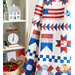 Quilt with rows of designs including stars, flags, houses, flowers, and various geometric shapes all made of red, white, and blue fabric,