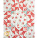 Quilt featuring floral and geometric patterns in red, pink, and teal on a cream background.