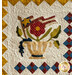 A floral appliqué design features a red flower with a flag in a decorative vase, surrounded by a quilted border.