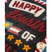 A close-up of a festive textile featuring the text Happy Fourth of July in bold, colorful letters. The design includes decorative elements like stars, stripes, and a patchwork border, emphasizing a patriotic theme.