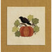 A black bird perched on a pumpkin surrounded by green leaves and vines on a beige background.