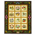 A quilt featuring twelve floral and animal appliqué squares on a dark brown background.