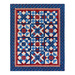 Stars and stripes quilt made of geometric blocks featuring red, blue, and cream, patriotic fabric prints.