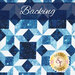 Tonal blue fabric with geometric design and small snowflakes labeled as backing.