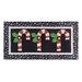 Black and white table runner featuring 3 candy canes with fabric yo-yos, all made of Winter themed fabric prints.