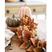 leaf themed centerpiece made with autumn colors and felt leaves.