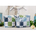 Two small bags with hanging charms and patchwork design made of blue, green, and white summer themed fabrics.
