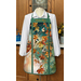 A decorative apron featuring autumn leaves and birds, personalized with the name Mary Alice.