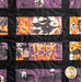 A close up of solid black borders around orange and purple Halloween fabrics