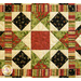 Colorful quilt featuring a star pattern with floral and striped designs in red, green, and black.