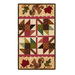 Pint Size Table Runner featuring leaf like geometric piecing and squirrel and leaf appliqué.