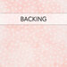 Pale pink mottled flannel fabric with white dots all over with a pink banner and the word 