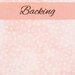 Pale pink mottled flannel fabric with white dots all over with a pink banner and the word 