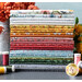 Photo of a stack of fabrics from the Wander Lane II collection with coordinating thread spools and flowers in the background.
