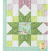 Close up of sawtooth star and checker design in pastel green and purple fabrics.