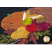 Wool placemat with appliqué of a horn filled with fruits and a pumpkin.