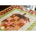 Close up of  Table runner with acorn pieced blocks made with brown and cream floral fabric prints.