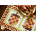 Table runner with acorn pieced blocks made with brown and cream floral fabric prints.