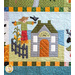 Quilt block featuring a house with the words gather and a scarecrow.