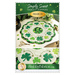 Image of a Shabby Fabrics pattern featuring a March-themed table topper featuring green shamrocks on a white background.