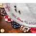 A close-up image of a Scalloped Table Topper in Coffee Always.